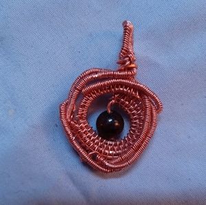 Garnet dragon eye wire wrapped pendant